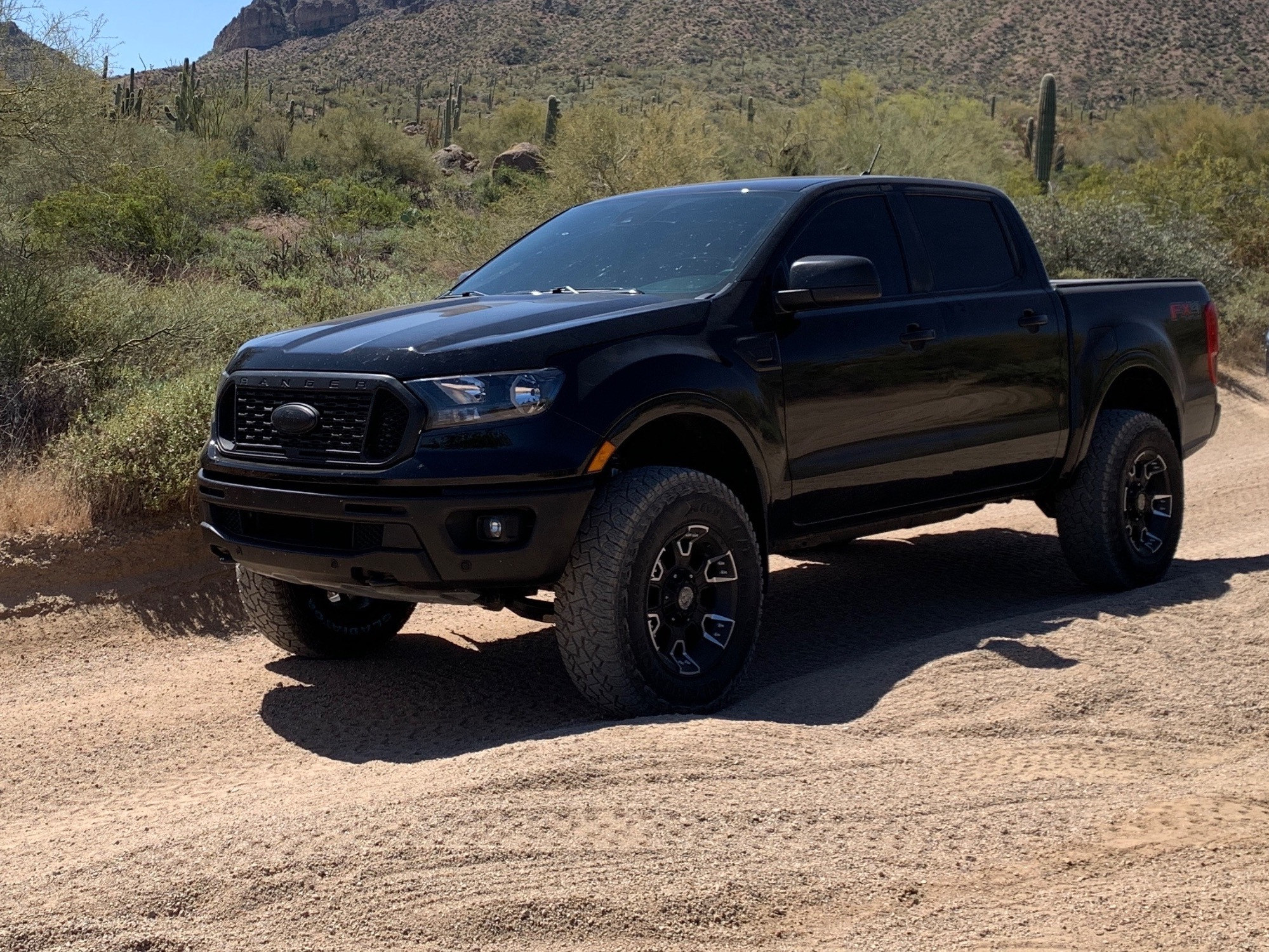 2019 Ford Ranger with Panther Offroad 902 wheels and Gladiator X-Comp A/T tires