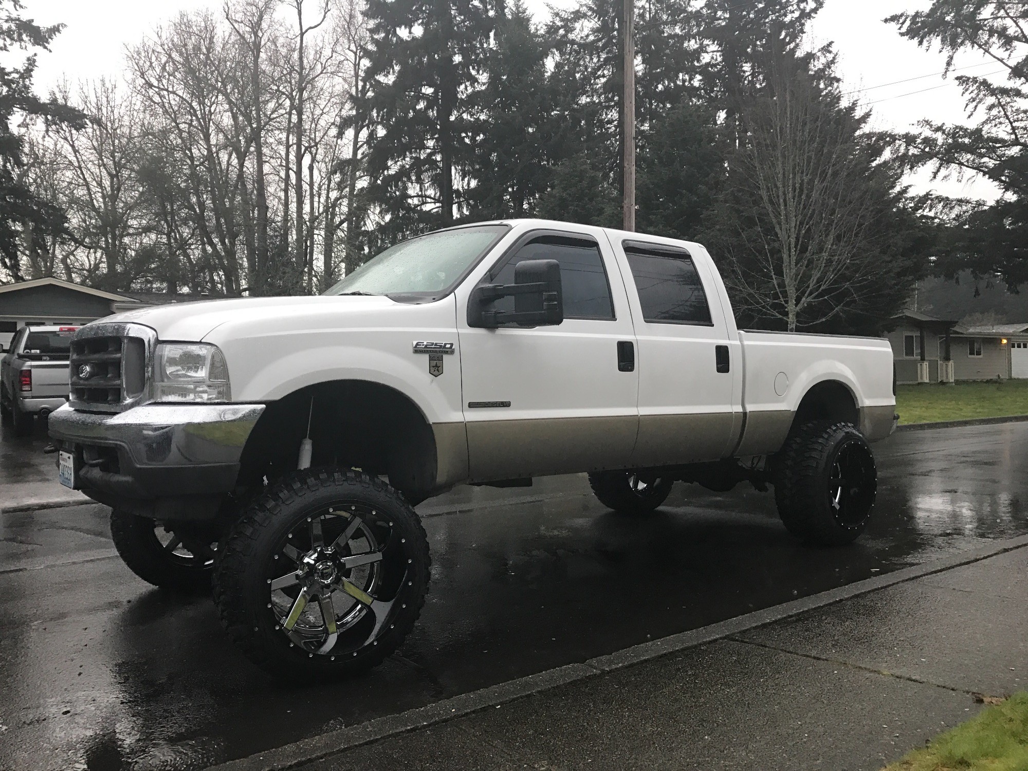 Squatted 2001 Ford F-250 with Fuel Maverick wheels
