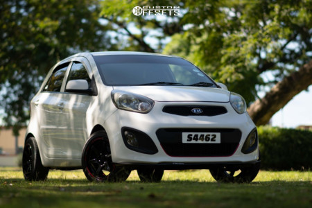 2011 Kia Rio with 15x7 20 Rays Engineering Te37 and 185/50R15 Achilles ...