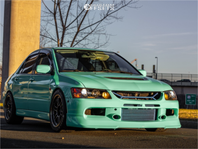 2003 Mitsubishi Lancer with 17x9.5 18 Enkei Rpf1 and 245/45R17