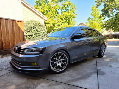 2016 Volkswagen Jetta with 18x8.5 42 Enkei Raijin and 225