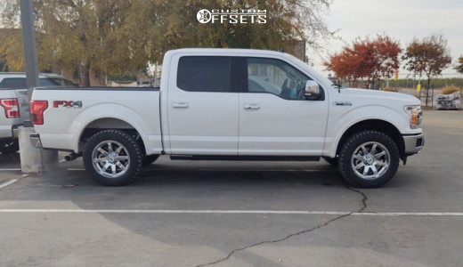 2019 Ford F-150 with 20x9 Chrome Hostile Alpha Wheels, 295/55R20 BFGoodrich Km3 tires, and Leveling Kit Bilstein Leveling Kits.