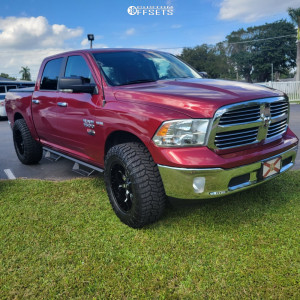 2014 Ram 1500 with 20x10 -25 Vision Manic and 35/12.5R20 Radar Renegade ...