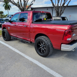 2014 Ram 1500 with 20x10 -25 Vision Manic and 35/12.5R20 Radar Renegade ...
