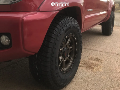 2015 Toyota Tacoma with 16x8 -6 DX4 Rebel and 265/75R16 Falken