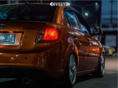 2011 Kia Rio with 16x7 42 Arrow Enterprise Black Racing Phantom M-1 and ...