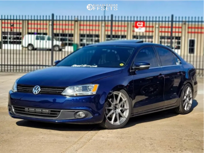 2011 Volkswagen Jetta with 18x8 45 Enkei Ts10 and 235/40R18