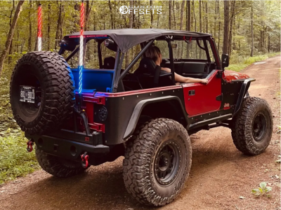 1997 Jeep TJ with 17x8.5 0 Vision Manx and 37/12.5R17 Milestar