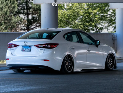 2017 Mazda 3 with 18x9 35 XXR 527d and 215/45R18 Dunlop Sp Sport