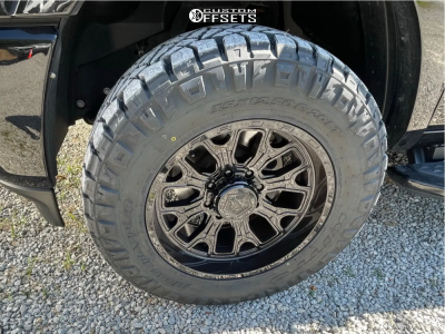 2019 Ram 2500 with 20x10 -19 TIS 560B and 35/12.5R20 Nitto Ridge ...