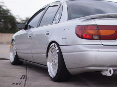 2002 Saturn SL2 with 16x8 20 ESM 002R and 205/40R16 Nitto Neo Gen and ...