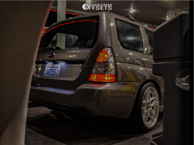 2006 Subaru Forester with 18x8.5 30 ESR Cs15 and 215/40R18 Federal 595