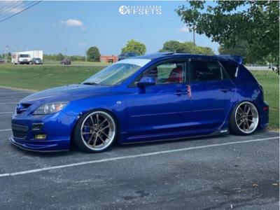 2007 Mazda 3 with 18x9.5 30 ARC Ar5 and 215/35R18 Lexani Lxuhp-207