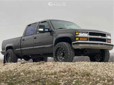 1998 Chevrolet K2500 with 22x12 -44 TIS 553BM and 33/12.5R22