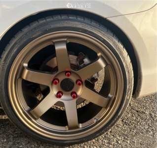 2009 Mazda 3 with 18x9.5 38 AVID1 Av6 and 225/40R18 Vercelli