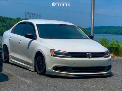 2013 Volkswagen Jetta with 17x7.5 42 Touren Tr60 and 215