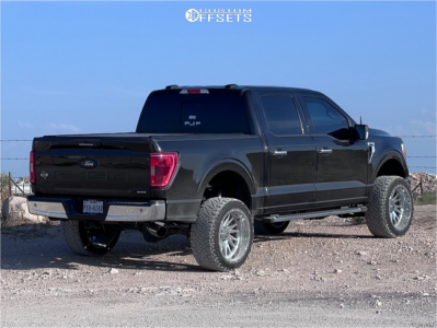 2021 Ford F-150 with 22x12 -44 TIS 547c and 33/12.5R22 Nitto Ridge