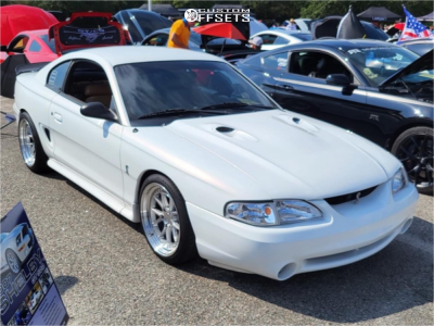 1997 Ford Mustang with 18x9.5 Silver Machined Aodhan Ds08 Wheels, 245/35R18 Continental ExtremeContact DWS06 PLUS tires, and Coilovers Sr Performance.