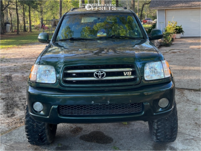 2002 Toyota Sequoia with 17x9.5 Black Black Rhino Armory Wheels, 315/70R17 Hankook Dynapro Mt2 tires, and Suspension Lift 4" Old Man Emu.