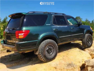 2002 Toyota Sequoia with 17x9.5 Black Black Rhino Armory Wheels, 315/70R17 Hankook Dynapro Mt2 tires, and Suspension Lift 4" Old Man Emu.