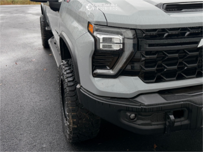 2024 Chevrolet Silverado 2500 HD with 20x10 Black Method NV Wheels, 35/12.5R20 Nitto Ridge Grappler tires, and Leveling Kit Rough Country Leveling Kits.