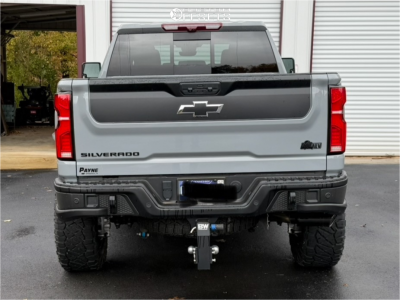 2024 Chevrolet Silverado 2500 HD with 20x10 Black Method NV Wheels, 35/12.5R20 Nitto Ridge Grappler tires, and Leveling Kit Rough Country Leveling Kits.