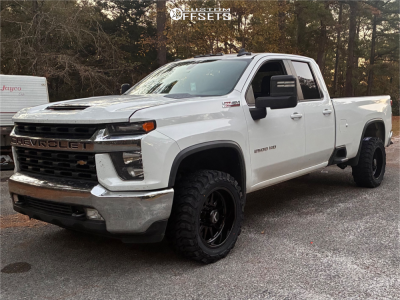 2020 Chevrolet Silverado 2500 HD with 20x10 Black KG1 Forged Clockwork Wheels, 33/12.5R20 Gladiator X Comp MT tires.