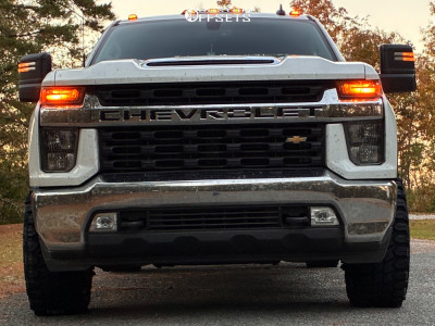 2020 Chevrolet Silverado 2500 HD with 20x10 Black KG1 Forged Clockwork Wheels, 33/12.5R20 Gladiator X Comp MT tires.