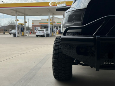 2016 Ram 2500 with 20x12 Black Milled ARKON OFF-ROAD Caesar Wheels, 35/13.5R20 RBP Repulsor XT RX tires, and Leveling Kit Rough Country Leveling Kits.