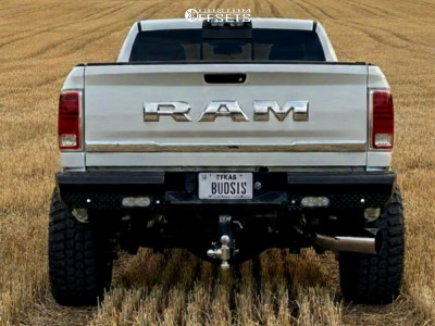 2016 Ram 2500 with 20x12 Black Milled ARKON OFF-ROAD Caesar Wheels, 35/13.5R20 RBP Repulsor XT RX tires, and Leveling Kit Rough Country Leveling Kits.