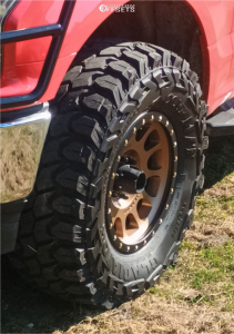 2019 Ford F-150 with 17x8.5 Bronze Method MR305 Wheels, 35/12.5R17 Gladiator X Comp MT tires, and Leveling Kit Rough Country Leveling Kits.