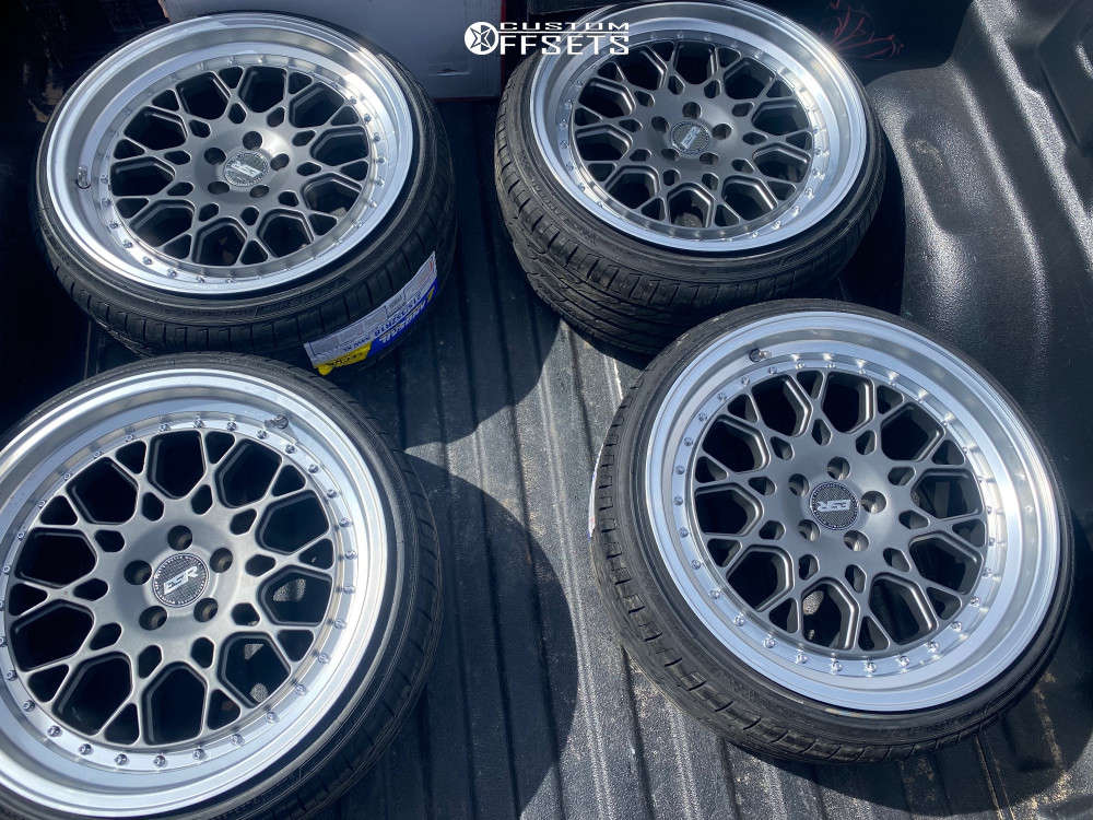 2014 Toyota Corolla with 18x9.5 35 ESR Cs3 and 215/35R18 Landsail Clv1 and Air Suspension