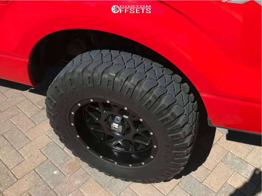 2011 Ford F150 with 18x9 12 XD Grenade and 275/70R18 Mickey Thompson Baja Legend Mtz and