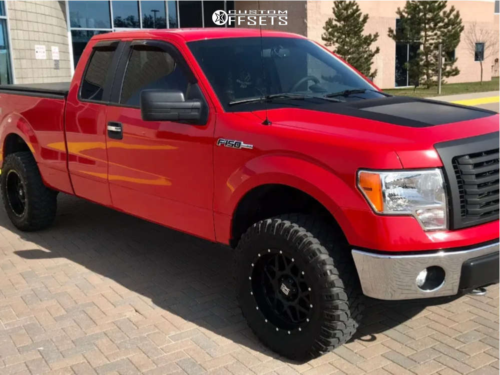 2011 Ford F150 with 18x9 12 XD Grenade and 275/70R18 Mickey Thompson Baja Legend Mtz and