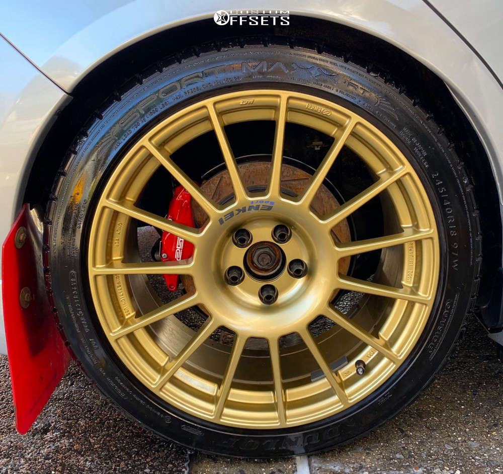 2008 Subaru Impreza with 18x8.5 48 Enkei RC-T4 and 245/40R18