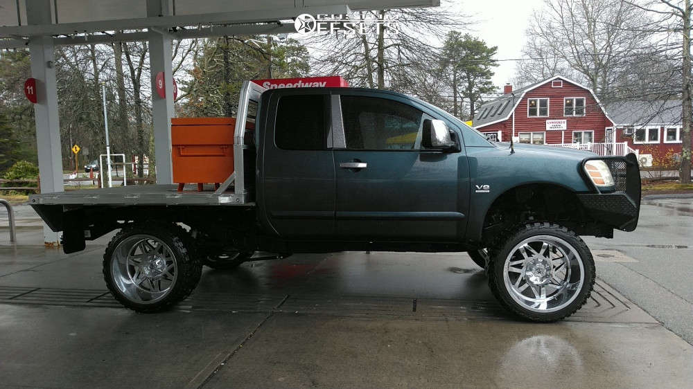 2004 Nissan Titan with 24x14 -76 RBP 71r and 35/13.5R24 AMP Mud Terrain