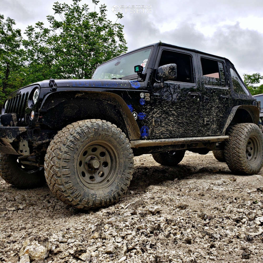 2015 Jeep Wrangler JK with 17x8 6 Pro Comp Series 98 and 35/12.5R17