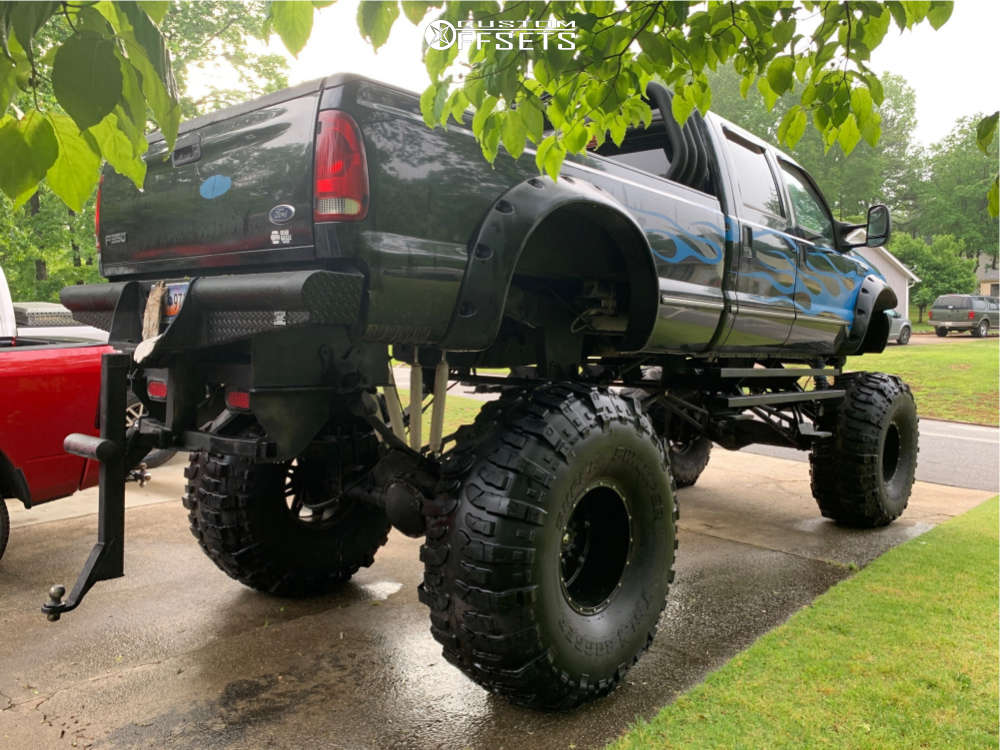 1999 Ford F350 Super Duty with 20x14 76 Fuel Octane and 54/19.5R20