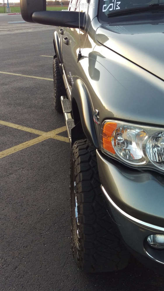 2005 Dodge Ram 2500 with 17x9 -12 Raceline Raptor and 33/12.5R17 Nitto ...