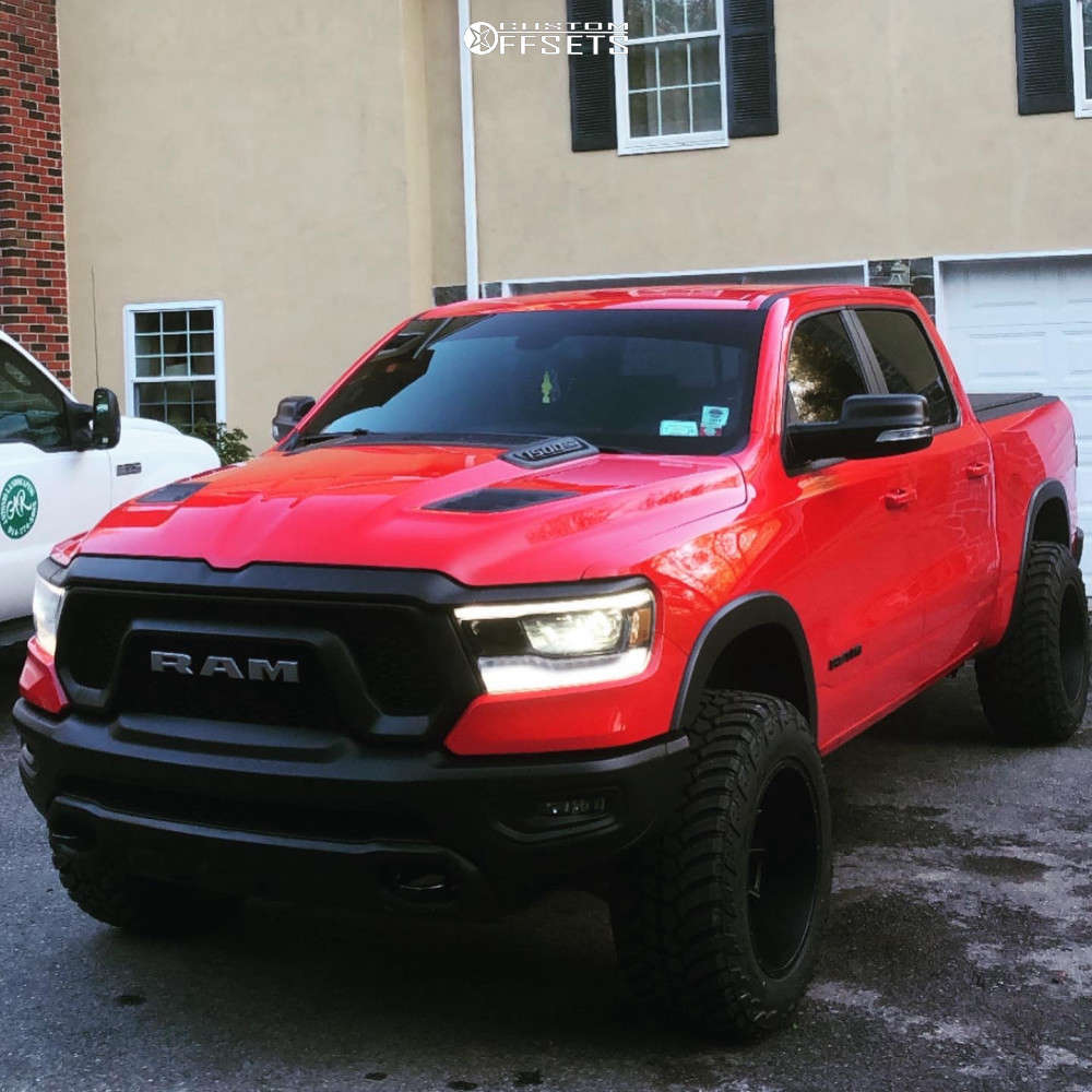 2019 Ram 1500 with 20x12 51 Vision Bomb and 35/12.5R20 AMP Mud Terrain