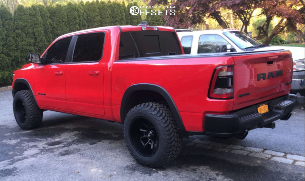2019 Ram 1500 with 20x12 51 Vision Bomb and 35/12.5R20 AMP Mud Terrain