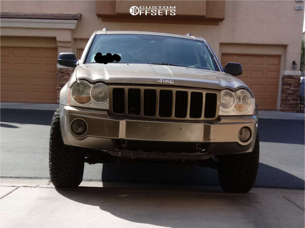 2005 Jeep Grand Cherokee with 17x8 -12 Vision Soft 8 and 265