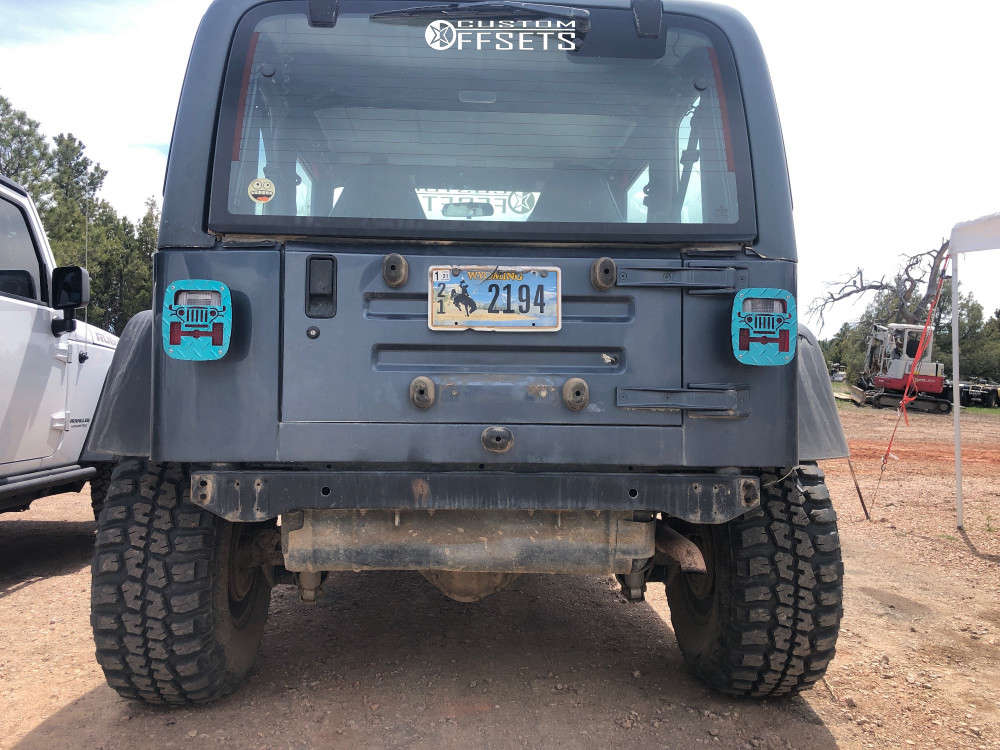 2001 Jeep TJ with 15x10 44 Ultra Mongoose and 33/12.5R15 Federal