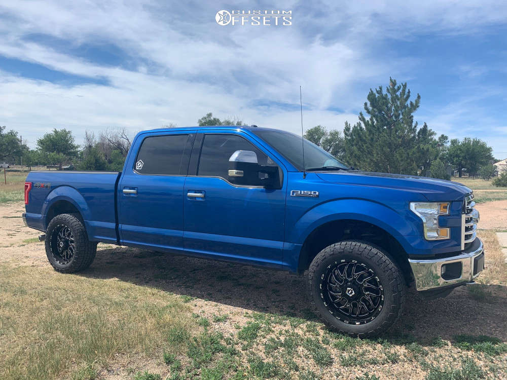 2015 Ford F150 with 20x9 TIS 544BM and 285/55R20 Cooper Discoverer At3