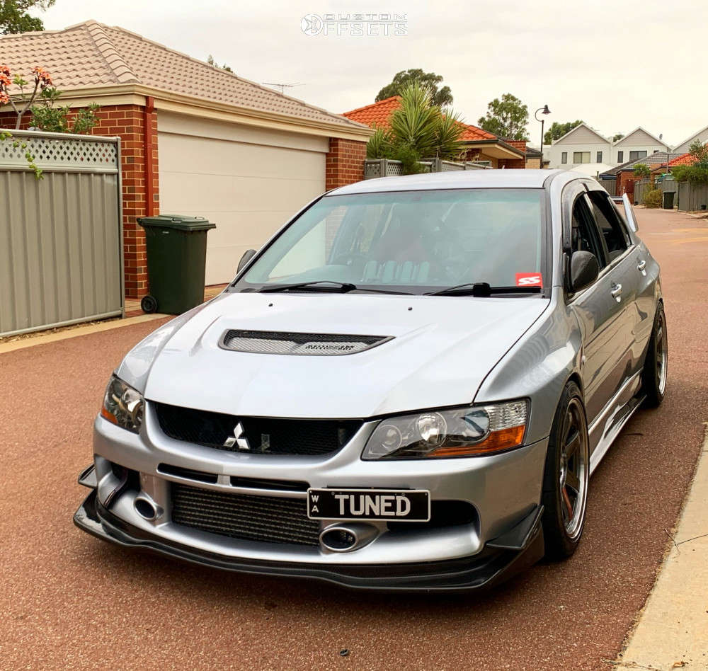 2006 Mitsubishi Lancer with 18x9.5 22 Volk Te37sl and 265/35R18 Falken ...