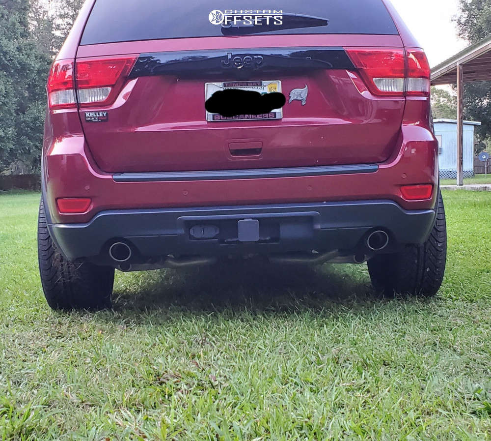 2012 Jeep Grand Cherokee with 24x10 10 DUB Roc and 275/30R24 Lexani Lx