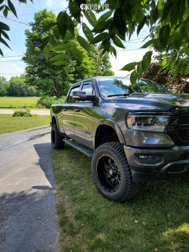 2020 Ram 1500 with 20x10 24 Ballistic Guillotine and 35/12.5R20 Atturo