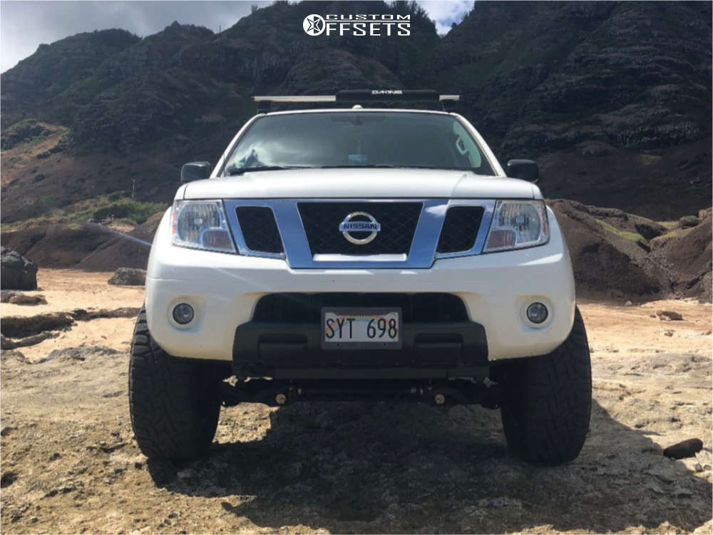 2016 Nissan Frontier with 18x9 12 Fuel Maverick and 33/12.5R18 Toyo Tires Open Country R/t and