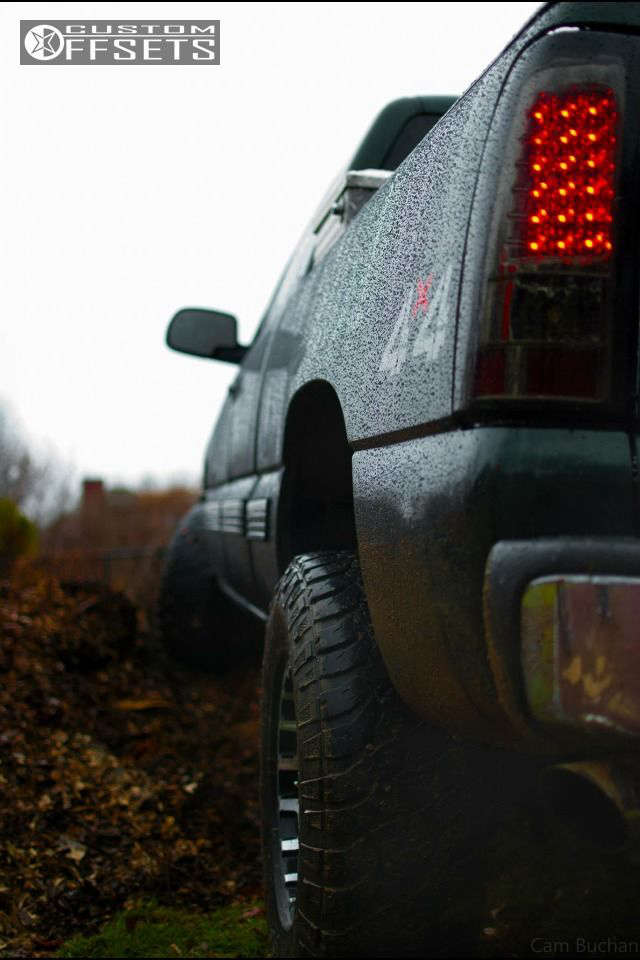 2001 Chevrolet Silverado 1500 with 16x8 6 American Outlaw Buckshot and