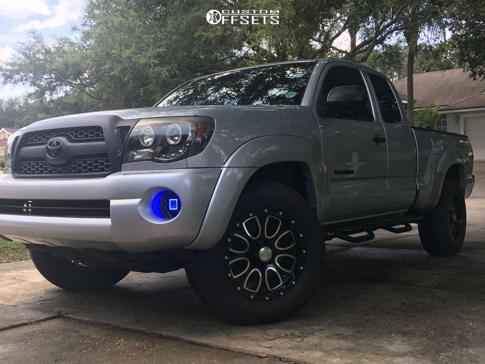 2011 Toyota Tacoma with 18x9 -12 Helo He879 and 265/65R18 Michelin ...